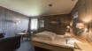 Cosy rooms with a mountain lodge atmosphere await you.