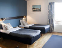 You will stay in cosy and spacious rooms with free parking right outside the door.