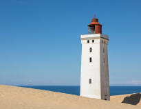 Utforska den ikoniska fyren Rubjerg Knude Lighthouse.