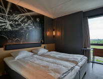 De eleganta rummen på Zleep Hotel Copenhagen Arena erbjuder en trevlig, lugn miljö.