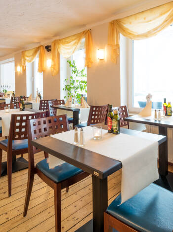 Dine on Italian and Northern German cuisine at the on-site restaurant.