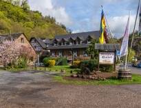 The family-run hotel is located next to an old mill, surrounded by beautiful nature near the Moselle River.