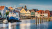Visit the old fishing town of Husum, where you'll find many good restaurants and seaside cafés in the town's cosy alleyways.