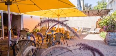 On a nice day, plan your adventures with a drink in hand on the hotel’s courtyard.