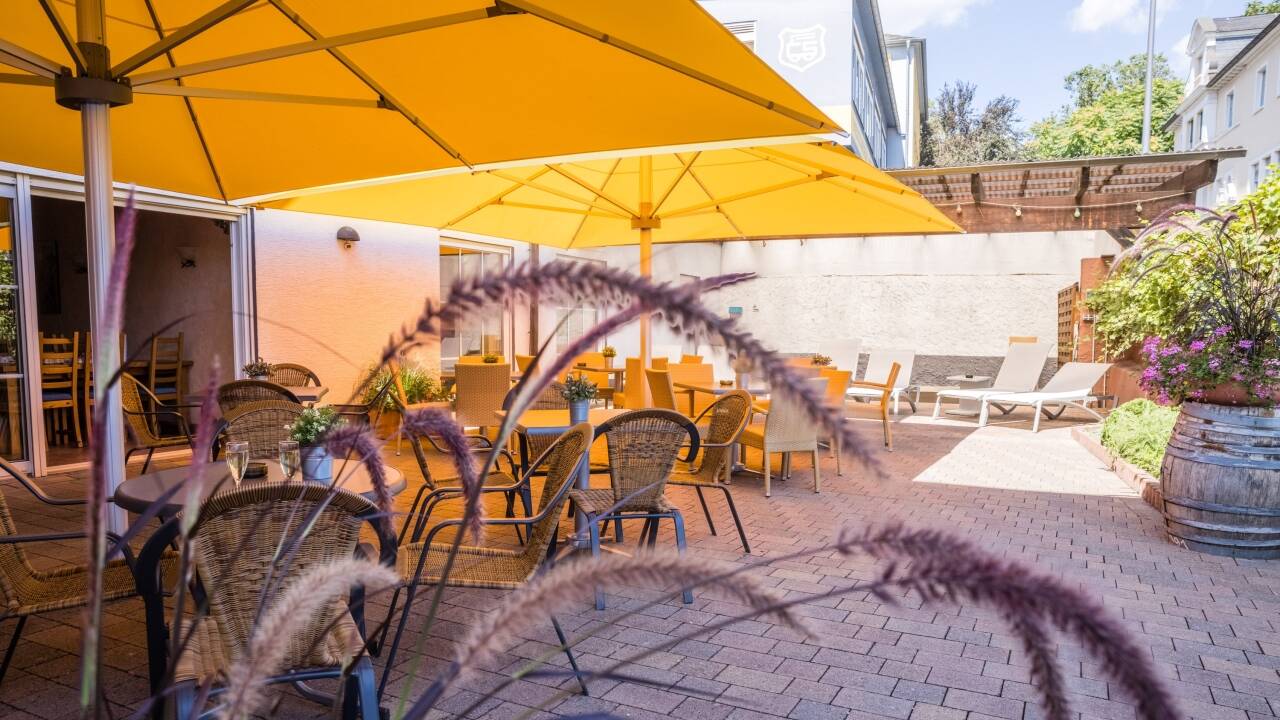 On a nice day, plan your adventures with a drink in hand on the hotel’s courtyard.