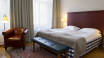 Dette hyggelige hotellet har en sentral beliggenhet i Köping i Sverige, og her er det ’Hästens’-senger på alle rommene.