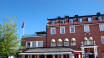 Dette hyggelige lille hotellet har en sentral beliggenhet på torvet i Strängnäs.