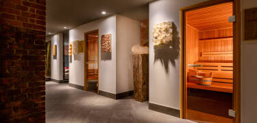 Slap af i wellnessområdet med sauna og fitnessfaciliteter.