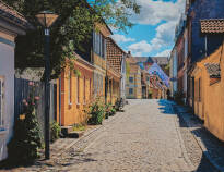 Comwell H. C. Andersen Odense ligger midt i det historiske sentrum av Odense.
