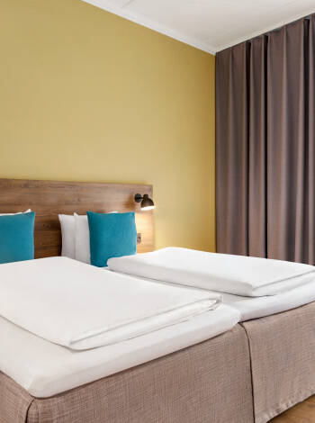 Das Hotel bietet Gastfreundschaft auf hohem Niveau und eine gemütliche Atmosphäre in seinen schönen Zimmern.