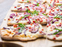 Enjoy a delicious tarte flambée at the hotel. You can choose from several varieties.