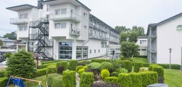 Relax in the peaceful hotel garden, perfect for unwinding outdoors.