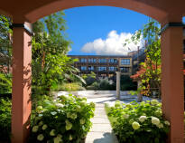 The hotel complex has a lush courtyard and rooms both with and without balcony