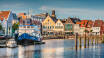 Gör en utflykt till spännande städer som Flensburg, Schleswig och Friedrichsstadt eller den vackra hamnstaden Husum