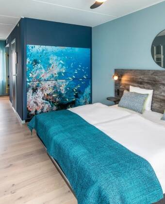 Bo i lyse, indbydende værelser og forkæl dig selv med en opgradering til Superior Room eller Suite.