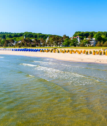 Alpine-themed luxury apartment house right on the shores of Binz Bay.