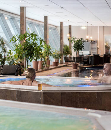 Værelsene er moderne og hyggelig innredet.
