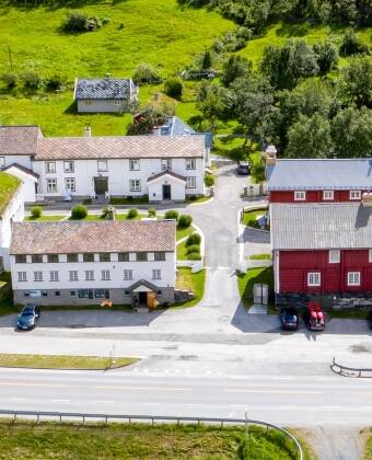 The hotel complex consists of a renovated farm and several mountain cabins.