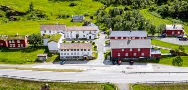 The hotel complex consists of a renovated farm and several mountain cabins.
