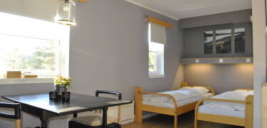 Die Zimmer haben ein charmantes Ambiente im traditionellen norwegischen Stil.