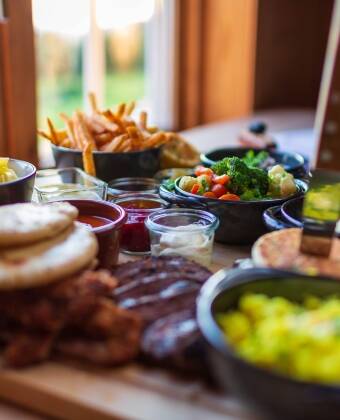 Kosten Sie die leckeren Gerichte des Restaurants: sie werden aus frischen Zutaten der Saison zubereitet.