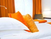 Hier werden Sie in eleganten, komfortabel eingerichteten Hotelzimmern untergebracht.