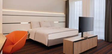 De moderne værelser tilbyder den største komfort med en gratis minibar.