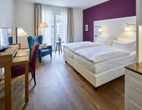 De elegante hotelværelser tilbyder ren luksus på jeres ophold.