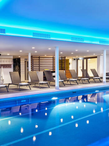 Relax in the spa with an indoor pool, saunas, ice fountain, and sensory showers.