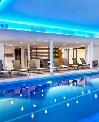 Relax in the spa with an indoor pool, saunas, ice fountain, and sensory showers.