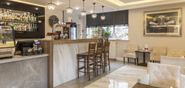 The hotel's bar and café serve amazing cocktails and freshly roasted 100% Arabica coffee.