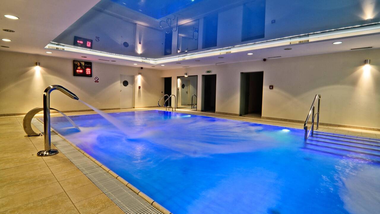 During your stay you can relax in the hotel's wellness area, which includes an indoor pool, hot tub, waterfall and saunas.