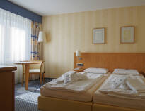 Wählen Sie zwischen den Zimmern im Haupthaus oder im Gästehaus - beide Zimmertypen bieten hohen Komfort.