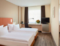 Rummen på Hotel Essential by Dorint Berlin-Adlershof är ljusa och moderna.