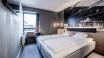 Rummen på Zleep Hotel Aarhus Skejby är snyggt inredda i klassisk skandinavisk stil.