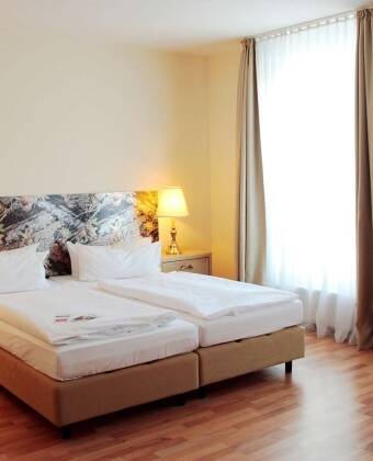 Du kommer att känna dig som hemma i de mysiga, elegant inredda rummen.
