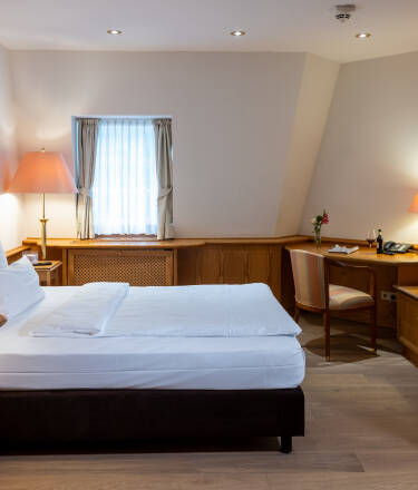 The hotel's rooms provide a stylish and comfortable setting for your stay.