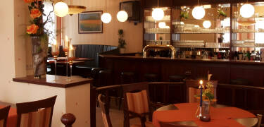 I hotellets bar kan I nyde en forfriskning eller en kop kaffe om aftenen og snakke om dagens oplevelser.