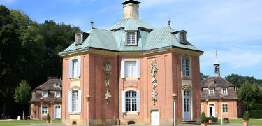 Visit the graceful baroque Clemenswerth Palace, which takes you on a fascinating journey through time in the style of the former electors.