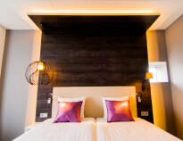 The hotel's rooms offer a modern and comfortable setting for your stay.