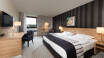 Dette 4-stjerners hotellet tilbyr koselige og moderne rom med høy komfort.