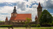 Visit the many sights in the region, such as the fortified church of Ostheim.