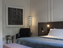 Genießen Sie einen extravaganten Aufenthalt im Kozmo Luxury Hotel Budapest mit den größten Zimmern der Stadt im Luxusstil.