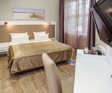 De stilfulla dubbelrummen ger en bekväm miljö för din vistelse i Tysklands näst största stad.