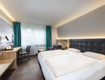Hotellets moderne værelser indbyder til afslapning og hygge og skaber en dejlig base for jeres ferie.