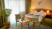 Rooms at Hotel Palace Hévíz are comfortably furnished and spacious.