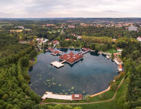 The thermal lake Hévíz invites you to swim or take a walk around the lake.