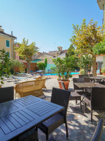 Sit on the hotel terrace and enjoy the sun and warmth.