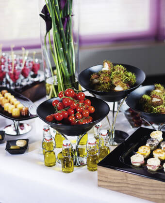 Enjoy culinary delights at the hotel restaurant or on the terrace during summer.