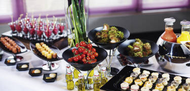 Enjoy culinary delights at the hotel restaurant or on the terrace during summer.